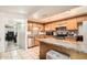 Spacious kitchen featuring stainless steel appliances and wood cabinetry at 6304 N 47Th Ave, Glendale, AZ 85301
