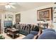 Cozy living room features comfortable seating and neutral walls at 6304 N 47Th Ave, Glendale, AZ 85301