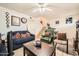 Comfortable living room with ceiling fan and staircase at 6304 N 47Th Ave, Glendale, AZ 85301