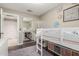 Charming bedroom with a loft bed, mirrored closet doors, and neutral color scheme at 6357 W Potter Dr, Glendale, AZ 85308