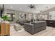 Open-concept living room with modern furniture and plenty of natural light at 6357 W Potter Dr, Glendale, AZ 85308