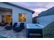 Relaxing backyard with spa, lounge chairs, and covered patio space perfect for entertaining or unwinding after a long day at 6450 E Vernon Ave, Scottsdale, AZ 85257