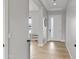 Bright entryway featuring wood floors and neutral paint palette at 6450 E Vernon Ave, Scottsdale, AZ 85257