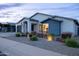 Charming single-story home featuring well-maintained landscaping and a modern design, creating a welcoming curb appeal at 6450 E Vernon Ave, Scottsdale, AZ 85257