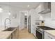 Well-appointed kitchen with stainless steel appliances, granite countertops, and ample cabinet space at 6450 E Vernon Ave, Scottsdale, AZ 85257