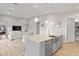 Stylish kitchen with open access to the living area and modern features at 6450 E Vernon Ave, Scottsdale, AZ 85257