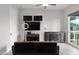 Stylish living room area with ample lighting, and comfortable seating at 6450 E Vernon Ave, Scottsdale, AZ 85257