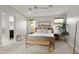 Relaxing main bedroom with neutral tones, a ceiling fan and natural light creates a serene retreat at 6450 E Vernon Ave, Scottsdale, AZ 85257