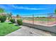 Backyard features brick pavers and artificial turf overlooking the community golf course at 6611 S San Jacinto St, Gilbert, AZ 85298