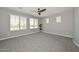 Spacious bedroom with carpeted floor, ceiling fan and plenty of natural light at 6611 S San Jacinto St, Gilbert, AZ 85298