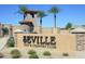 Entrance to the Seville Golf and Country Club community, featuring a stone wall sign at 6611 S San Jacinto St, Gilbert, AZ 85298