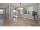 Elegant dining space with tile floors, backyard access, and open window views at 6611 S San Jacinto St, Gilbert, AZ 85298