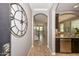Inviting foyer with tile flooring, arched doorways, and views into the living spaces at 6611 S San Jacinto St, Gilbert, AZ 85298