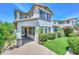 Inviting two-story home featuring desert landscaping, covered porch, and stylish exterior finishes at 6611 S San Jacinto St, Gilbert, AZ 85298