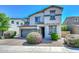 Charming two-story home featuring stucco siding, a two-car garage, and well-manicured landscaping at 6611 S San Jacinto St, Gilbert, AZ 85298