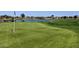 Beautiful golf course with a green and lake, perfect for a relaxing day of golf at 6611 S San Jacinto St, Gilbert, AZ 85298