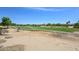 Scenic view of the meticulously kept golf course and community landscaping at 6611 S San Jacinto St, Gilbert, AZ 85298