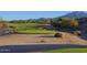 Scenic golf course featuring rolling hills, sand traps, and mountain views at 6611 S San Jacinto St, Gilbert, AZ 85298