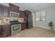 Well-appointed kitchen with granite countertops, stainless steel appliances, and ample storage at 6611 S San Jacinto St, Gilbert, AZ 85298