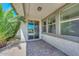 Covered patio features brick flooring, neutral stucco, and views of the backyard at 6611 S San Jacinto St, Gilbert, AZ 85298