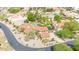 Stunning aerial view of an estate showcasing its lush landscaping, sparkling pool, and elegant architecture at 700 N Dobson Rd # 34, Chandler, AZ 85224