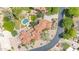 Aerial view of a luxurious property featuring a private pool, fountain, and a well-manicured lawn at 700 N Dobson Rd # 34, Chandler, AZ 85224