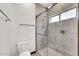 Modern bathroom with a glass-enclosed shower featuring marble-style tile and a rainfall shower head at 700 N Dobson Rd # 34, Chandler, AZ 85224