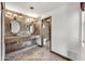 The bathroom features unique mirrors, countertops, and tile design at 700 N Dobson Rd # 34, Chandler, AZ 85224