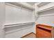 Walk-in closet with built-in shelving and drawers, maximizing storage space and organization at 700 N Dobson Rd # 34, Chandler, AZ 85224