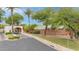 Welcoming community entrance featuring mature landscaping and clean design at 700 N Dobson Rd # 34, Chandler, AZ 85224