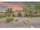 Stunning home with lush landscaping and desert landscaping leading to the grand entrance at 700 N Dobson Rd # 34, Chandler, AZ 85224