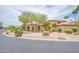 Charming property with mature landscaping and a circular driveway leading to the front entrance at 700 N Dobson Rd # 34, Chandler, AZ 85224