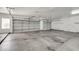 Spacious two-car garage with ample room for parking and storage, and bright interior lighting at 700 N Dobson Rd # 34, Chandler, AZ 85224
