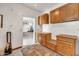 Utility room with storage cabinets and access to the garage at 700 N Dobson Rd # 34, Chandler, AZ 85224