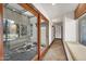 Hallway with sliding glass doors to an indoor/outdoor water feature at 700 N Dobson Rd # 34, Chandler, AZ 85224
