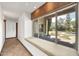 Hallway with an inviting window seat overlooking the backyard and pool at 700 N Dobson Rd # 34, Chandler, AZ 85224