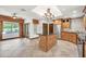 Inviting kitchen next to dining area with island and stainless appliances at 700 N Dobson Rd # 34, Chandler, AZ 85224