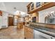 Spacious kitchen with stainless appliances, granite counters, and wood cabinets at 700 N Dobson Rd # 34, Chandler, AZ 85224