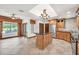 Bright kitchen with stainless appliances, wooden cabinets, and center island at 700 N Dobson Rd # 34, Chandler, AZ 85224