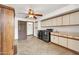 Spacious laundry room with modern washer and dryer, built-in cabinets, and a utility sink at 700 N Dobson Rd # 34, Chandler, AZ 85224