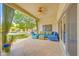 Cozy covered patio with outdoor seating and backyard views, perfect for enjoying the Arizona weather at 700 N Dobson Rd # 34, Chandler, AZ 85224
