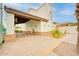Tennis courts and clubhouse showcasing architectural details and landscaping at 700 N Dobson Rd # 34, Chandler, AZ 85224