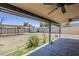 Spacious backyard with covered patio, a storage shed and potential for outdoor activities at 7135 W Flower St, Phoenix, AZ 85033