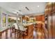 Spacious kitchen with wood floors, granite island, stainless steel appliances and custom cabinets at 7304 E Bent Tree Dr, Scottsdale, AZ 85266