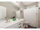 This bathroom has a double sink and a shower with a window to allow natural light to enter the room at 7385 W Honeysuckle Dr, Peoria, AZ 85383