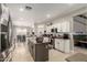 Spacious kitchen featuring a central island, modern appliances, and ample cabinet space at 7385 W Honeysuckle Dr, Peoria, AZ 85383