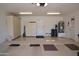 Spacious garage with ample storage, water heater, and utility features at 9130 W Utopia Rd, Peoria, AZ 85382