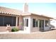 Enclosed back patio with a water feature and small garden bed at 9130 W Utopia Rd, Peoria, AZ 85382