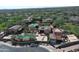 Aerial view of multiple homes with pools, landscaping, and surrounding desert terrain at 9939 E Desert Jewel Dr, Scottsdale, AZ 85255