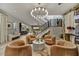 Inviting living room with comfortable seating, a modern staircase, and an open floor plan for entertaining at 9939 E Desert Jewel Dr, Scottsdale, AZ 85255